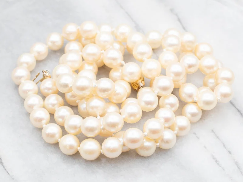 ladies necklace bar feather-Long Saltwater Pearl Strand Necklace