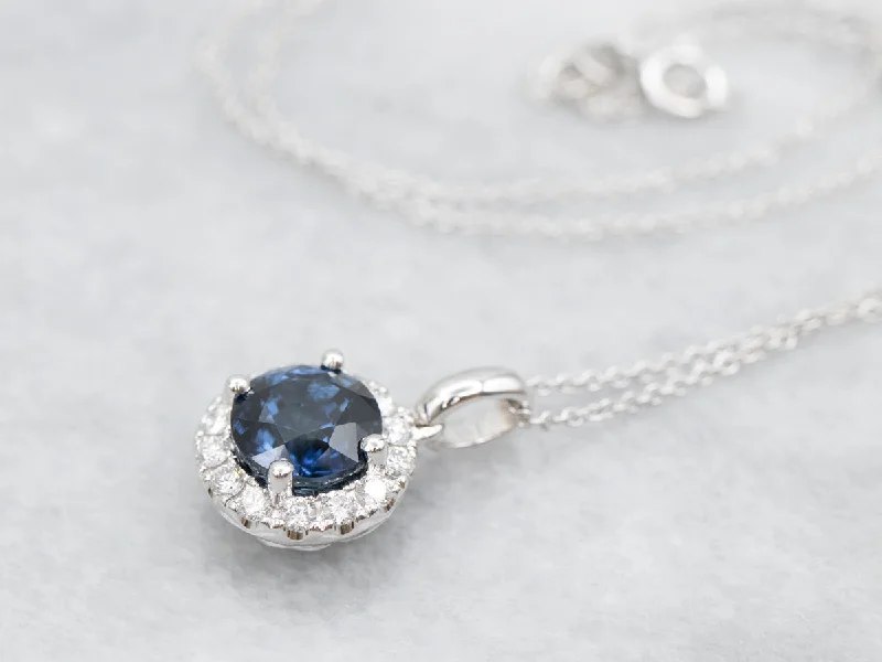 ladies necklace slim matinee length-Sapphire and Diamond Halo Pendant Necklace