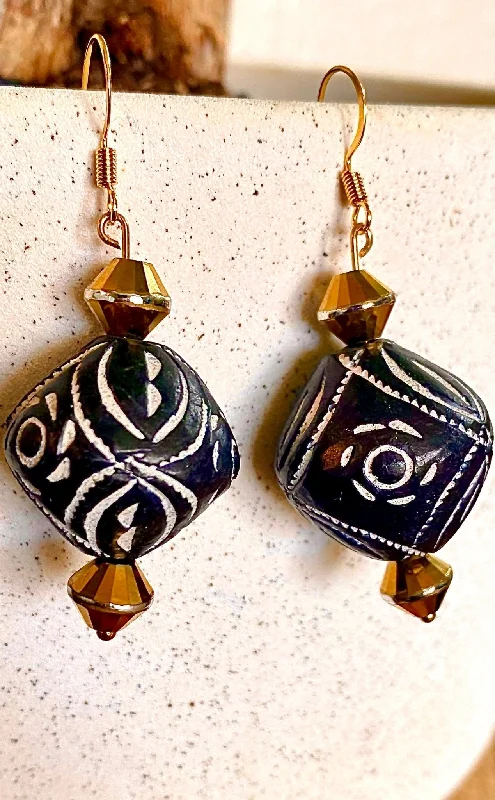 Ladies earrings limited run designs-Hand painted African diamond shape traditional earrings.