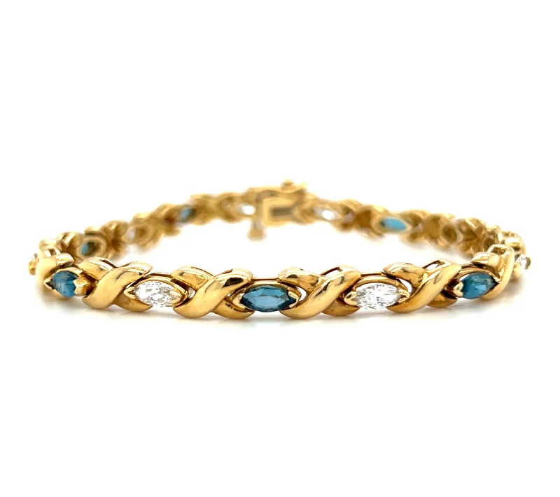 ladies bracelet beach butterfly-Pre-Owned 18k Yellow Gold Marquise London Blue Topaz & Diamond X Link Bracelet